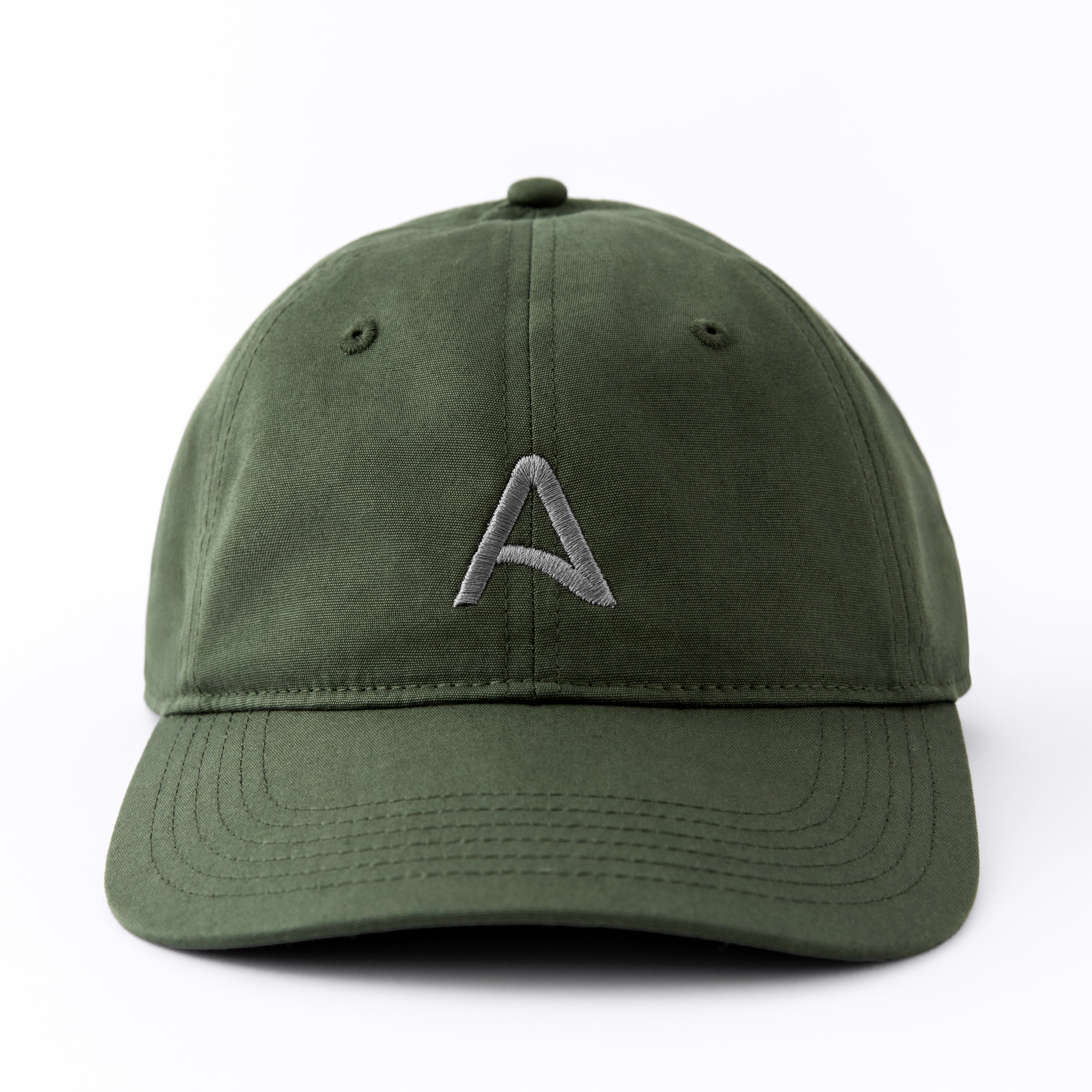 Front view of an Avelamer Caledonia Cap in Cypress Grove green with embroidered gray A-flag logo on a white background