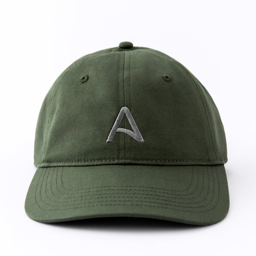 Front view of an Avelamer Caledonia Cap in Cypress Grove green with embroidered gray A-flag logo on a white background
