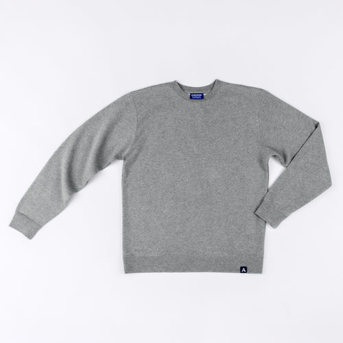 Avelamer Cazneau Crew sweatshirt in Morning Fog heather gray with a blue Avelamer Sausalito, California woven neck label and A-flag hem label.