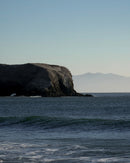 Shadow side of the Marin Headlands extending into the Pacific Ocean