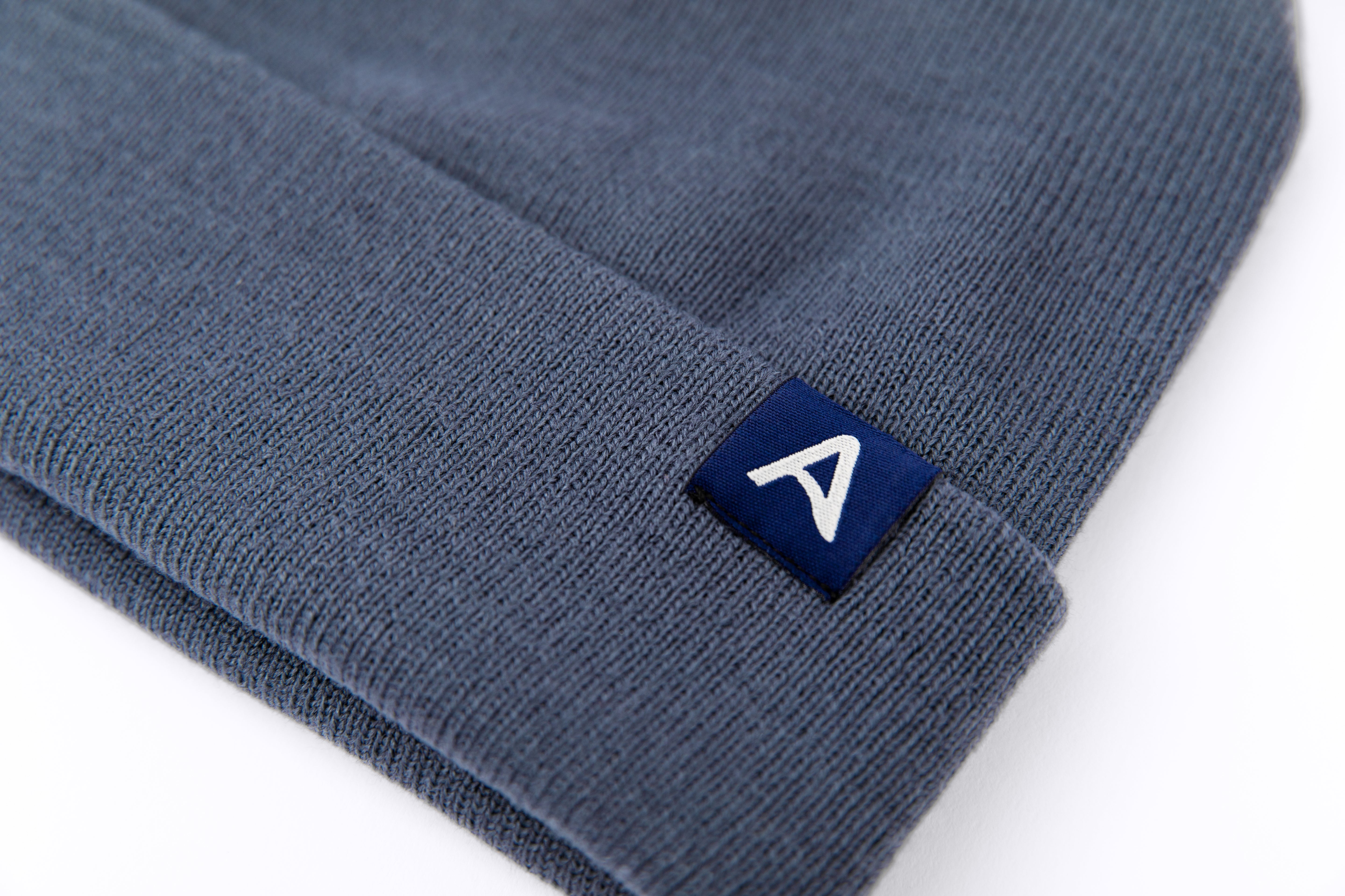 Avelamer Harbor Beanie in Ocean Slate blue gray with blue A-flag logo woven cuff label