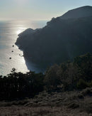 Shadow side of the Marin Headlands with late afternoon sun over the Pacific Ocean