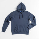 Avelamer Sausalito Hoodie in Ocean Slate blue-gray with a blue woven branded neck label and A-flag logo hem label against a white background
