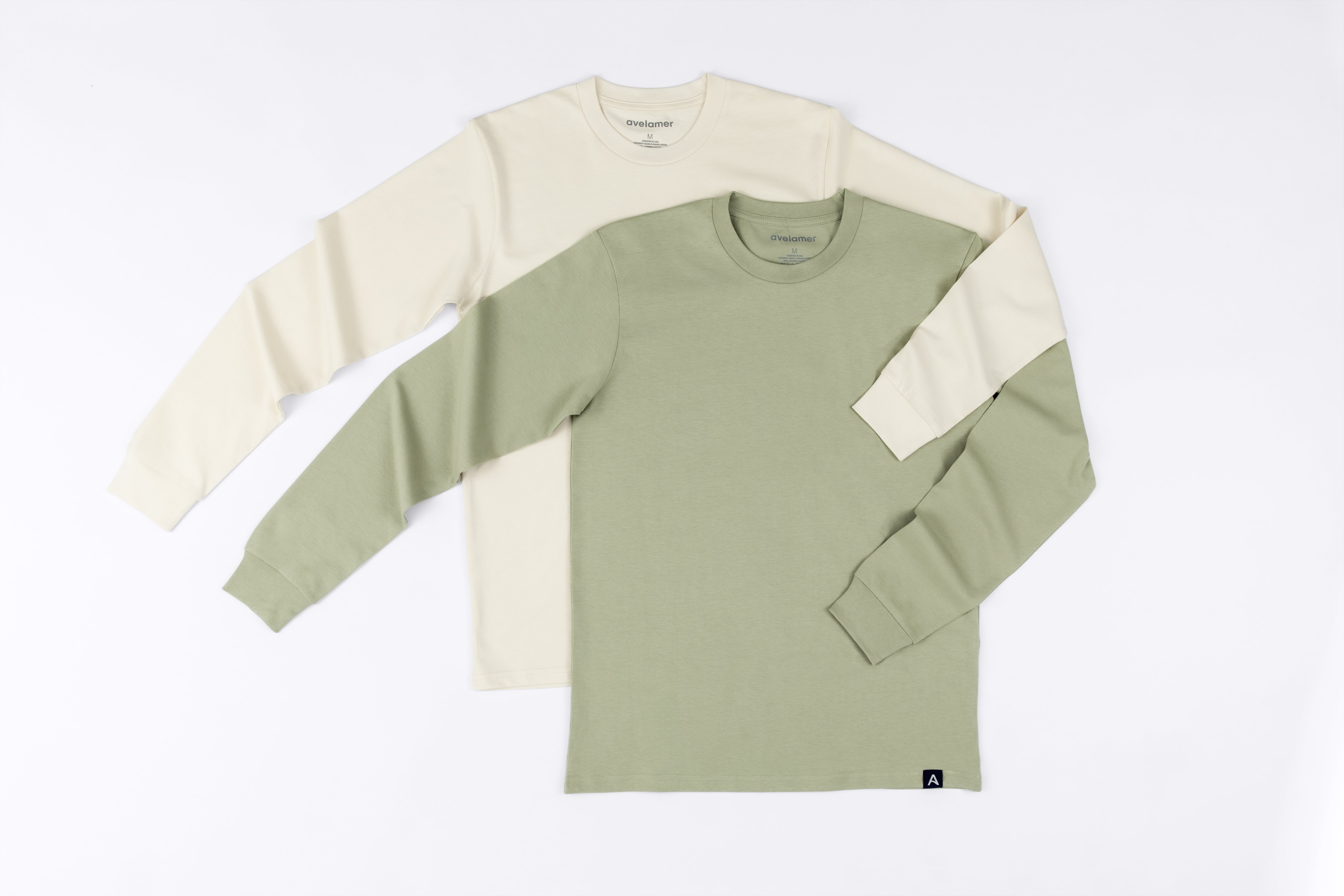 Green and off-white long-sleeve shirt on a white background